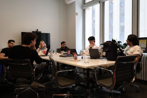 Hackers building at the Evolved Technology AI in medicine hackathon